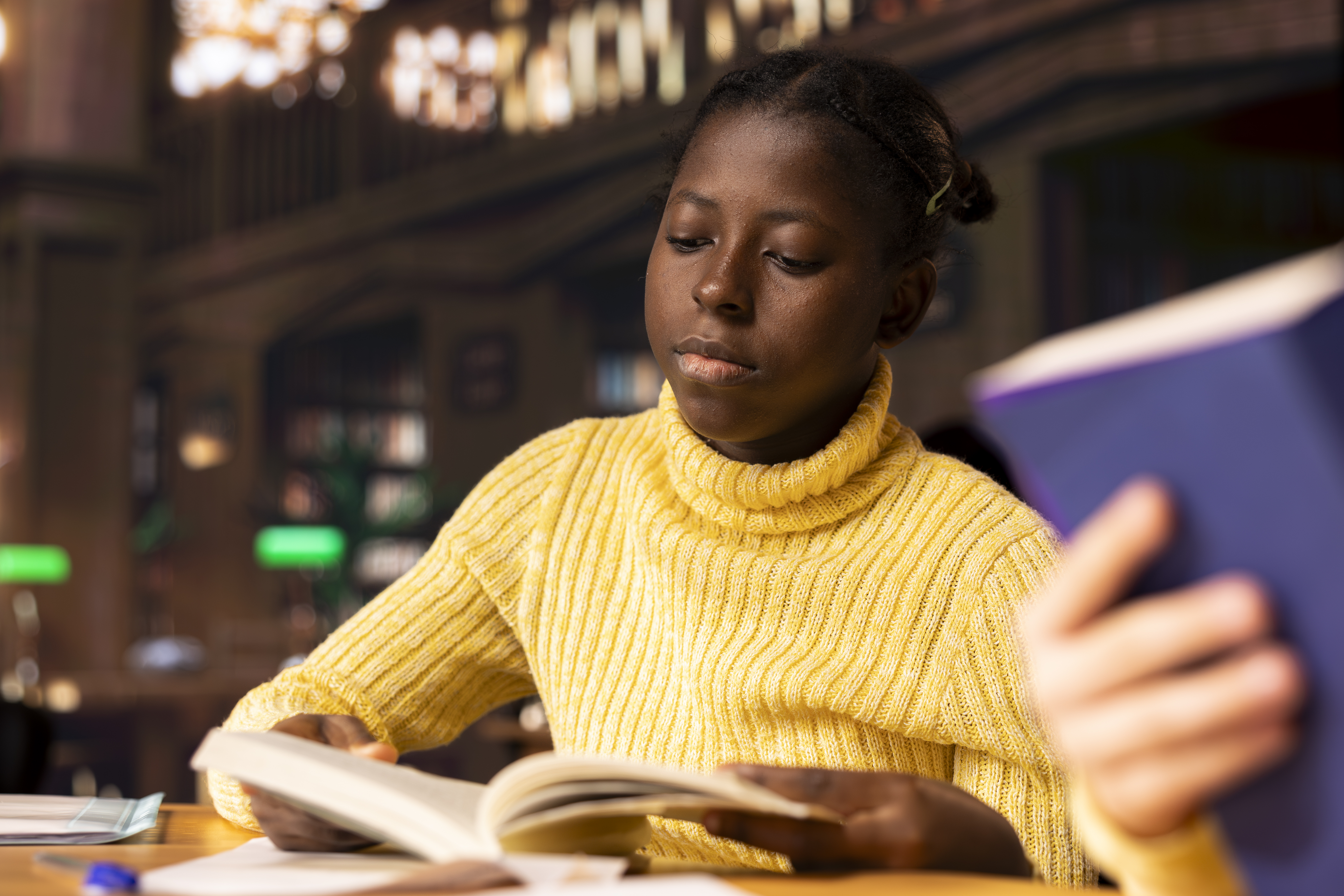 Black student studying in a library